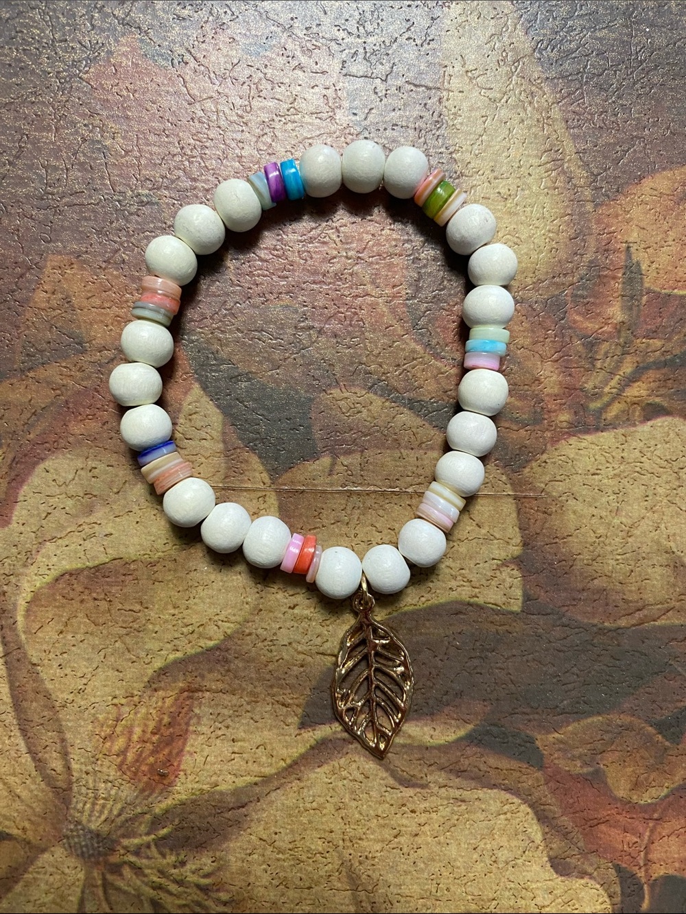 Handmade White Beaded Bracelet with Gold Leaf Charm